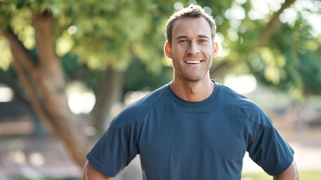 man exercising in park